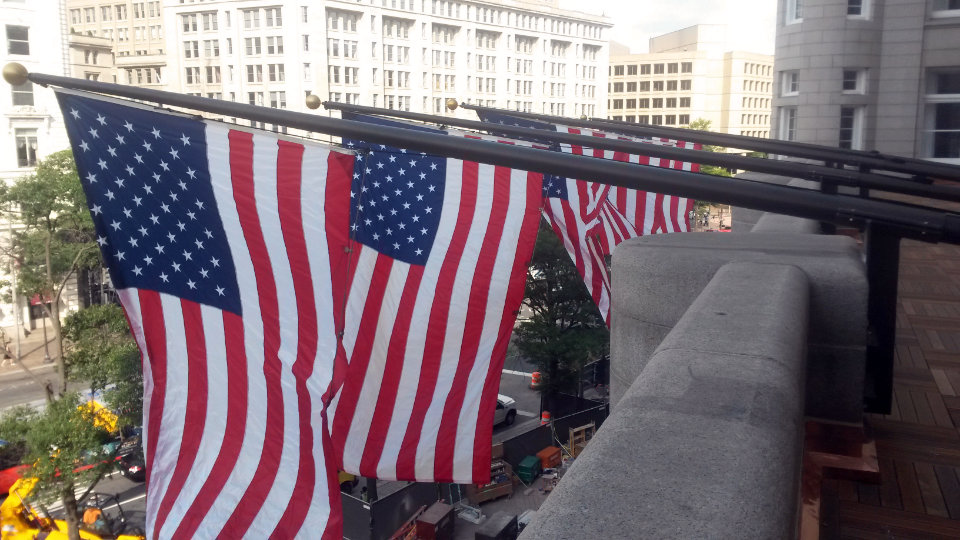 Mr. Flagpole sets up snap hooks, flag arrangements, retainer rigs, counterweights, swivels and springs Mr. Flagpole sets up snap hooks, flag arrangements, retainer rigs, counterweights, swivels and springs