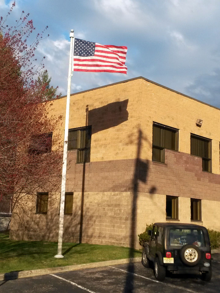 Unstuck American flag flies after being unstuck by Mr. Flagpole Maintenance Unstuck American flag flies after being unstuck by Mr. Flagpole Maintenance